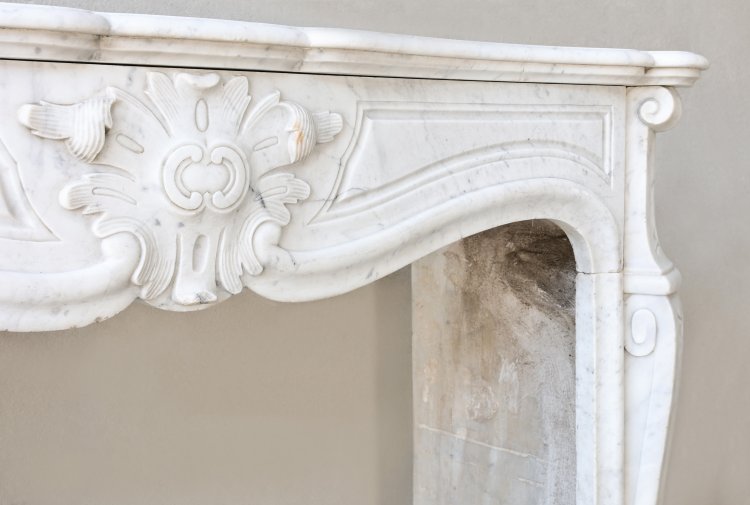 old mantle of carrara marble