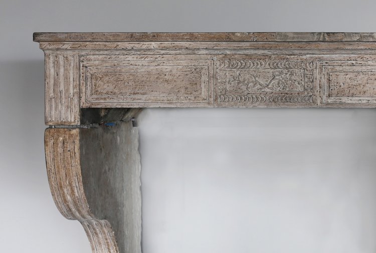 antique fireplace of limestone