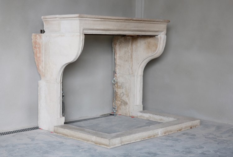 antique limestone fireplace