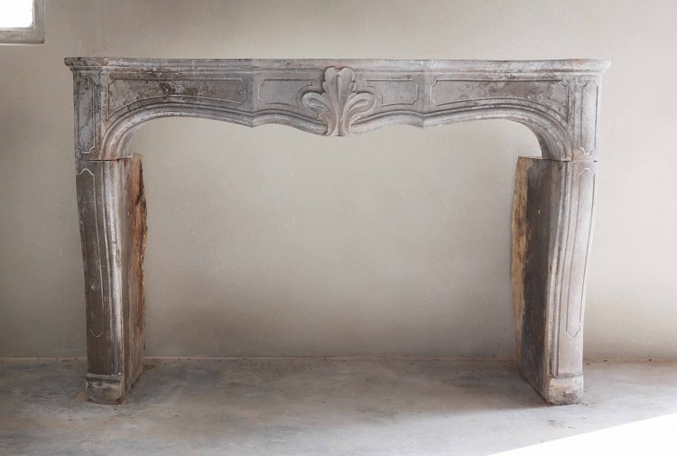 antique fireplace of limestone