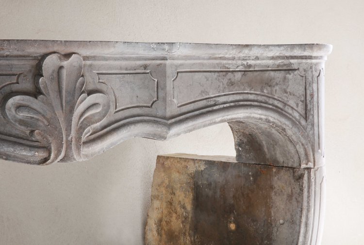 antique fireplace of limestone