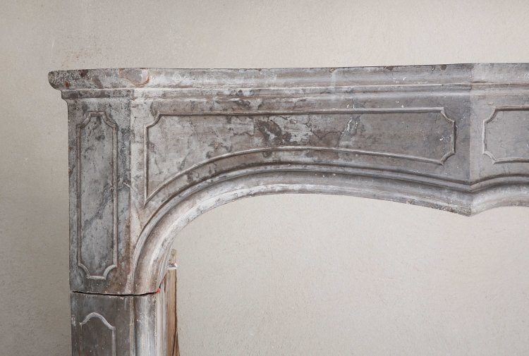 antique fireplace of limestone