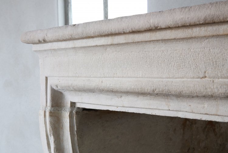 antique limestone fireplace