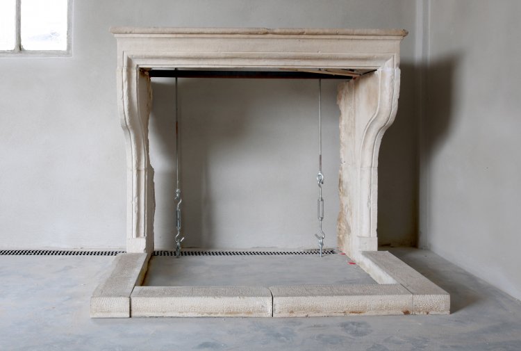 antique limestone fireplace