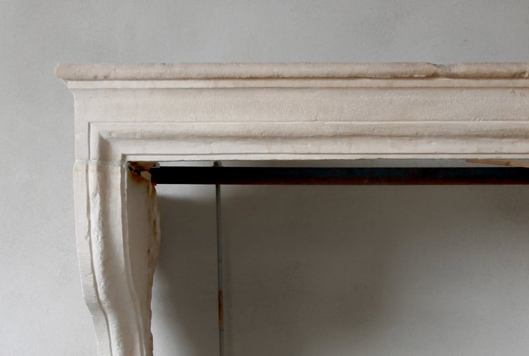 antique limestone fireplace