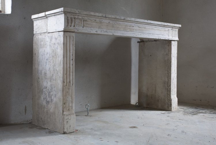 antique limestone fireplace