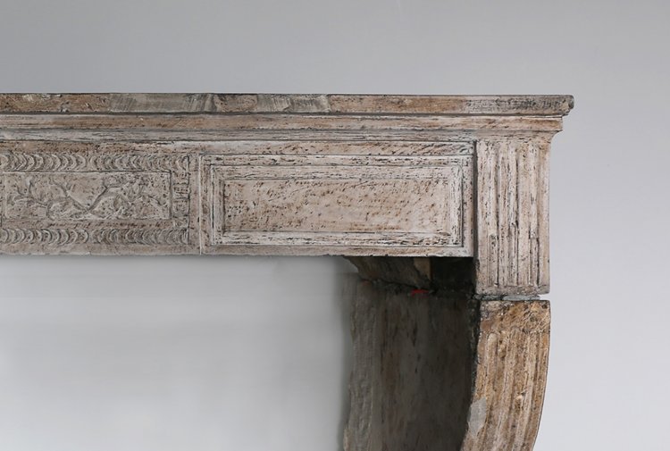 antique fireplace of limestone