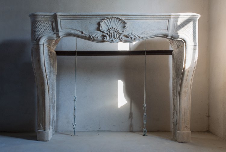 Antique limestone fireplace