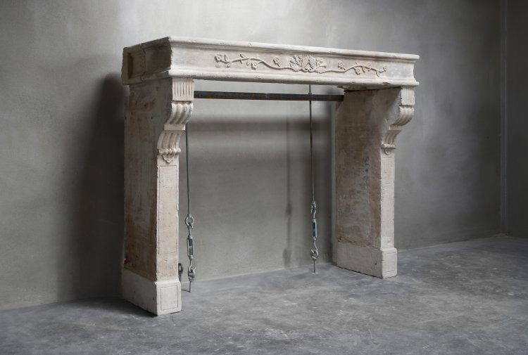 antique mantel of french limestone