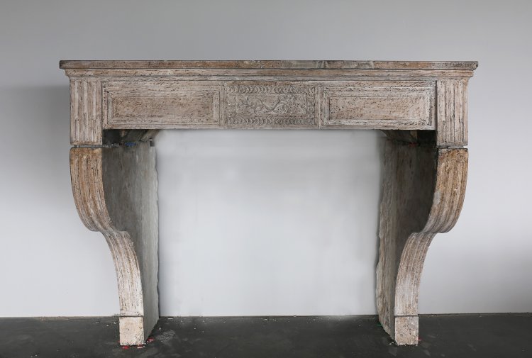 antique fireplace of limestone