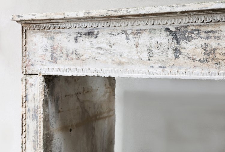 old mantel of french limestone