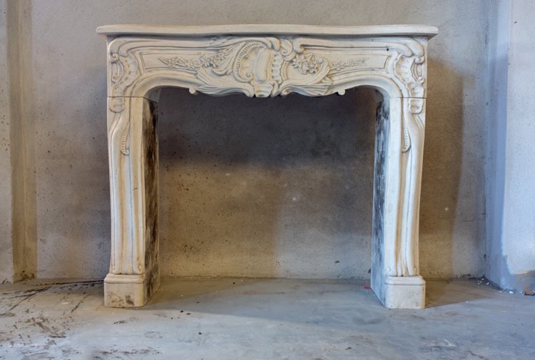 antique limestone fireplace