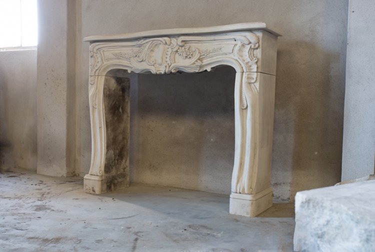 antique limestone fireplace