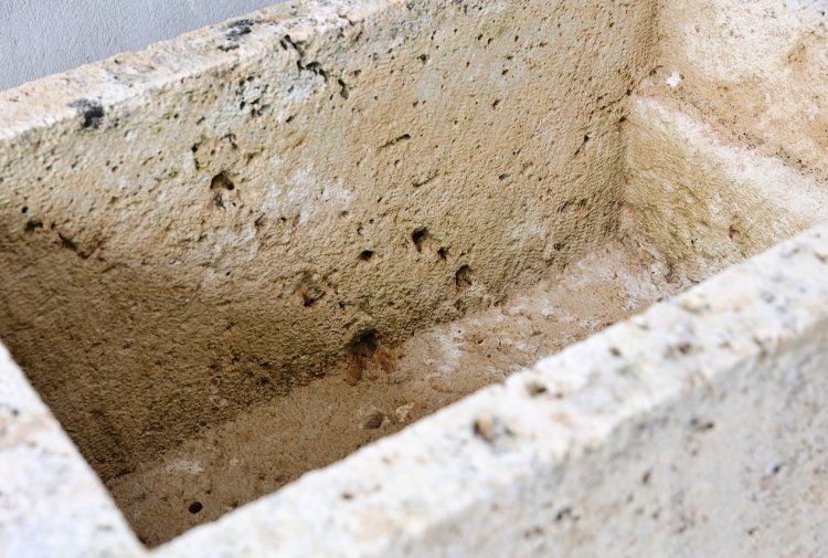 old wash basin of french limestone