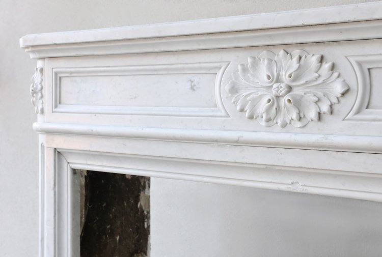 old fireplace of carrara marble